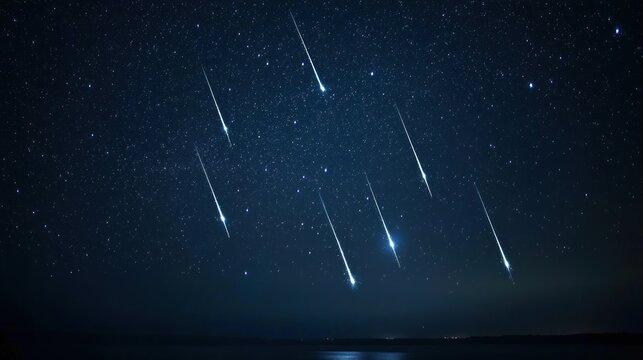 Starfall over lake at night