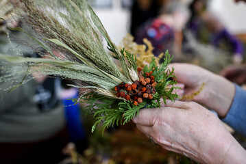 The process of making traditional Lithuanian Easter palm, using dried flowers and branches