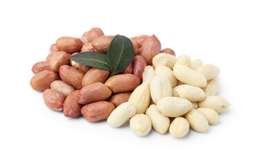 Pile of fresh peanuts and leaves isolated on white
