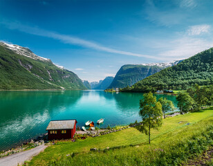 norwegian landscape with green lake oldevatnet in oldedalen valley camping in olden by lake oldevatnet norway