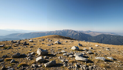 Rocky mountain landscape against a clear blue sky  