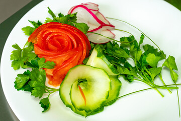 Fresh vegetable garnishes beautifully arranged on a plate