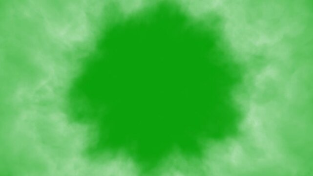 Smoke or fog moving on the circle, approaching fog on a green chrome key background, fog creeping along the ring and approaching the viewer, seamless loop of smoke. White smoke round motion