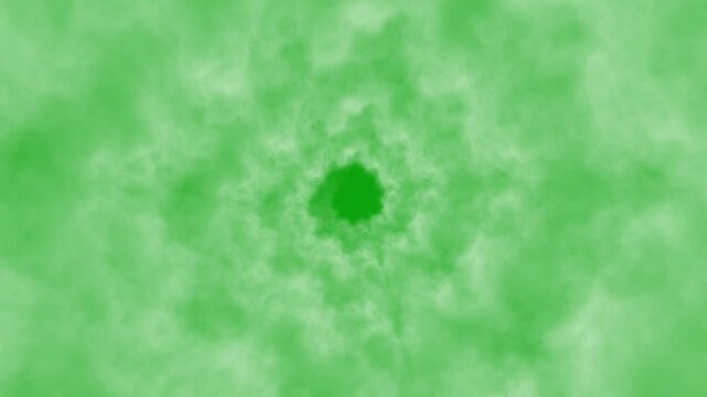 Smoke or fog moving on the circle, approaching fog on a green chrome key background, fog creeping along the ring and approaching the viewer, seamless loop of smoke. White smoke round motion