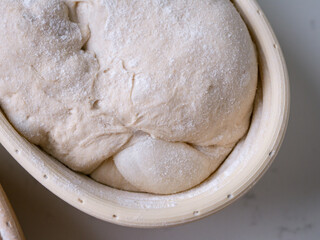 Sourdough Bread in Proofing basket, bannetons baskets for retarding raw dough before baking.
