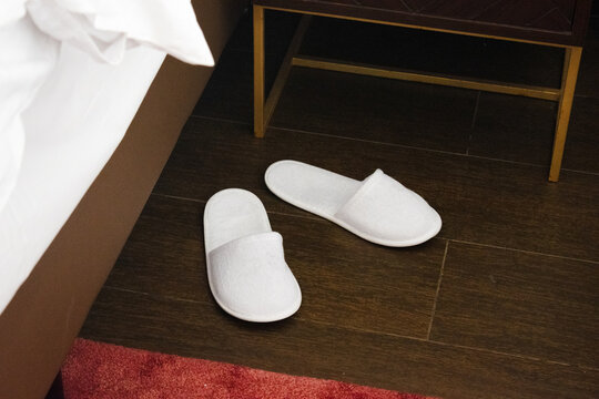 White slip on hotel sandal