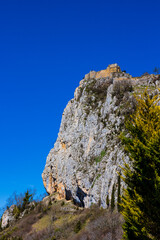 Ruins of the Cathar fortress of Roquefixade, located on a limestone spur above the village