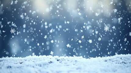 Snowflakes falling on winter ground
