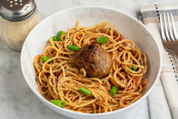 spaghetti with scallions and meat ball