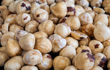 Close up photo  of a pile of hazelnuts. Food concept.