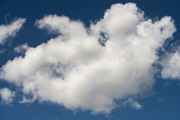 Beautiful blue sky with fluffy clouds.