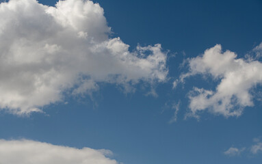 Beautiful blue sky with fluffy clouds.