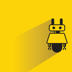 robot cartoon character icon with shadow yellow background