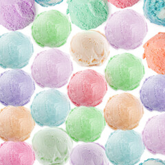Yummy ice cream of different flavors. Colorful scoops on white background