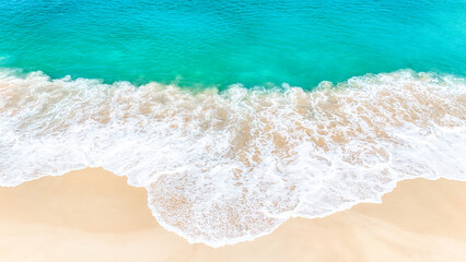 Breathtaking ocean view of turquoise waves rolling onto white sand. summer background and summer holiday concept.