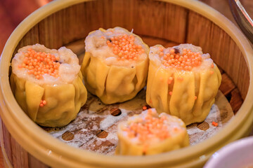 Shu Mai dim sum dumplings with crab roe topping at a San Francisco restaurant