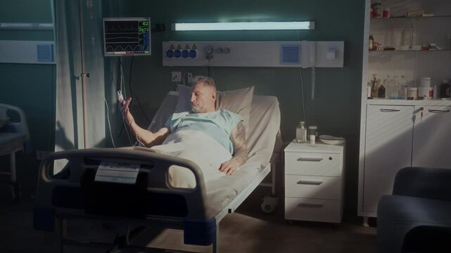 Old man wondered to see pulsimeter and dripper in ward bed