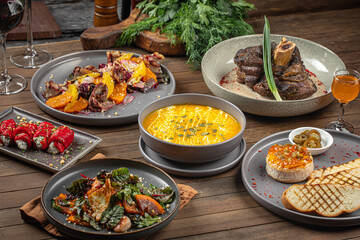 Restaurant table served with different german dishes