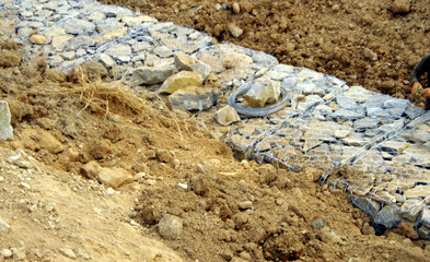 construction of storm water drains with Gabian and stones