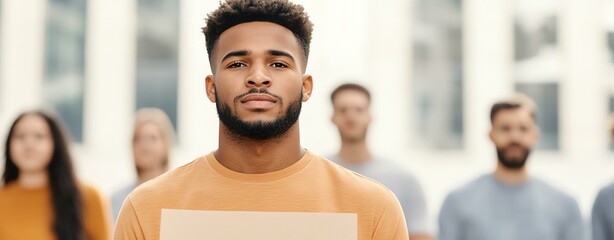 employment rights message A group of individuals participating in a peaceful protest, highlighting unity and awareness for important social issues.