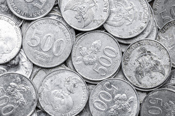 Indonesian Rupiah Coins Close-Up. Pile of Indonesian 500 Rupiah Coins. Stack of penny coins