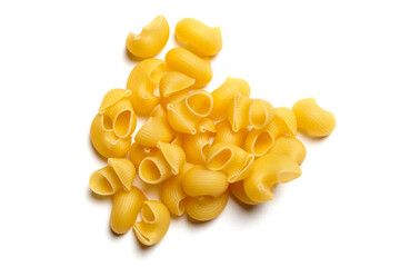 Top view of uncooked yellow pipe rigate pasta scattered on a clean white background, ideal for packaging, cooking visuals, or food blogs