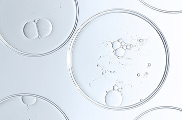 The texture of a cosmetic serum or body gel in a Petri dish.