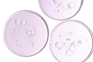 The texture of a cosmetic serum or body gel in a Petri dish.