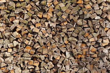 Beautiful background of chopped firewood with natural wood texture