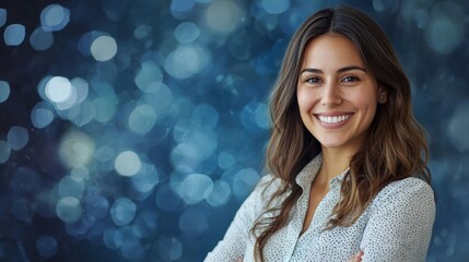 a smiling woman with her arms crossed 