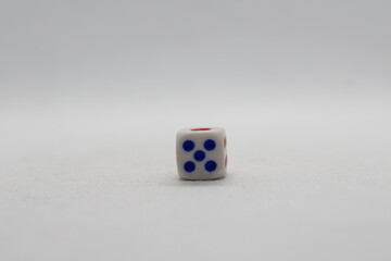 Playing dice isolated on a white background. Playing dice with number five or 5