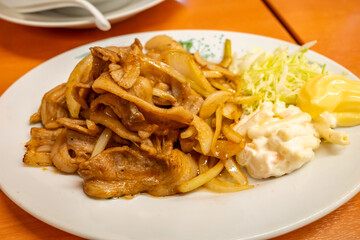 Pork fried with ginger in Japanese style in Japanese restaurant