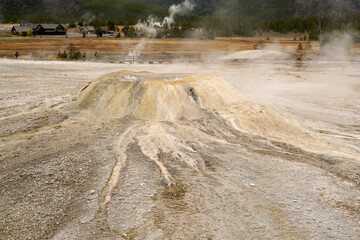 Yellowstone National Park Wyoming with bubbling and steaming geyser