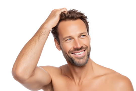 Shirtless white man in his 30s smiling and touching hair on white background