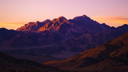 Fototapeta premium Majestic Mountain Range at Sunset: A Breathtaking Panorama