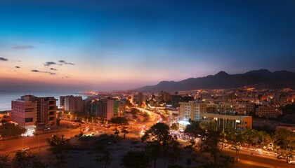 asmara eritrea cityscape with bokeh lights at dusk