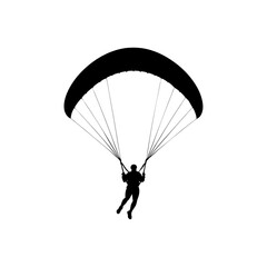 paraglider silhouette on a blue sky