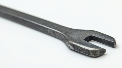 Obraz premium A close-up of a sturdy pry bar with a flat tip, on a white background