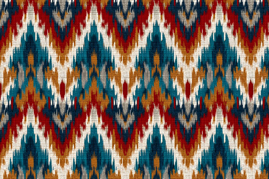 Colorful ikat fabric pattern with red blue mustard zigzag