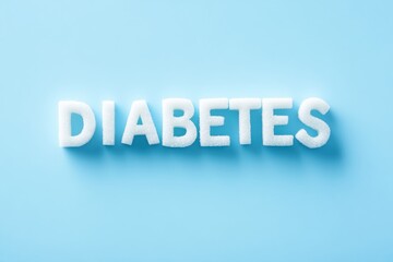Fototapeta premium Diabetes text in white block letters on a light blue background with soft shadows creating depth and focus