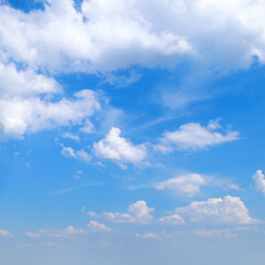 Fantastic white clouds against blue sky