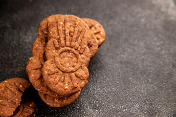 Chocolate cookie nuts sweet cereal dessert organic product fresh tasty gourmet food background on the table rustic food top view copy space