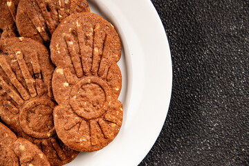 Chocolate cookie nuts sweet cereal dessert organic product fresh tasty gourmet food background on the table rustic food top view copy space