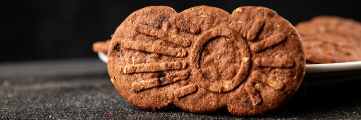 Chocolate cookie nuts sweet cereal dessert organic product fresh tasty gourmet food background on the table rustic food top view copy space
