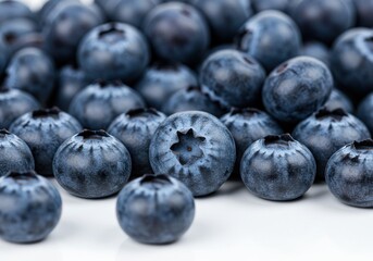 Fresh blueberries scattered macro photography isolated white background