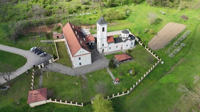 Aerial Drone View of Serbian Orthodox Monastery with Courtyard in Forest