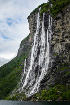 Waterfall falling into fjord in Norway
