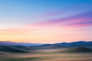 Obraz premium scenic vista of serene campsite at dawn with no people highlighting rolling hills under vibrant sky