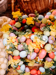 Vibrant Easter decorations displayed on supermarket shelves in lively spring setting