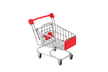 Online shopping concept.Cardboard box and shopping bags in a trolley isolated on white background....